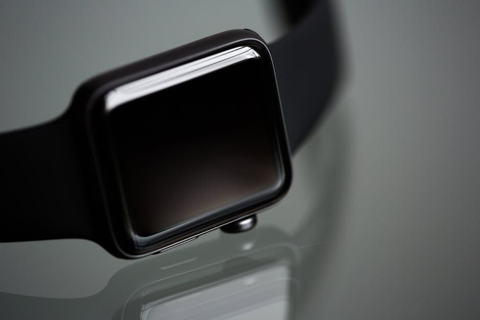 Detailed close-up of a stylish modern smartwatch with a black band, ideal for tech enthusiasts